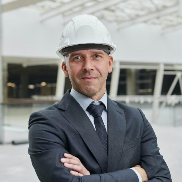confident-businessman-at-construction-site-1.jpg